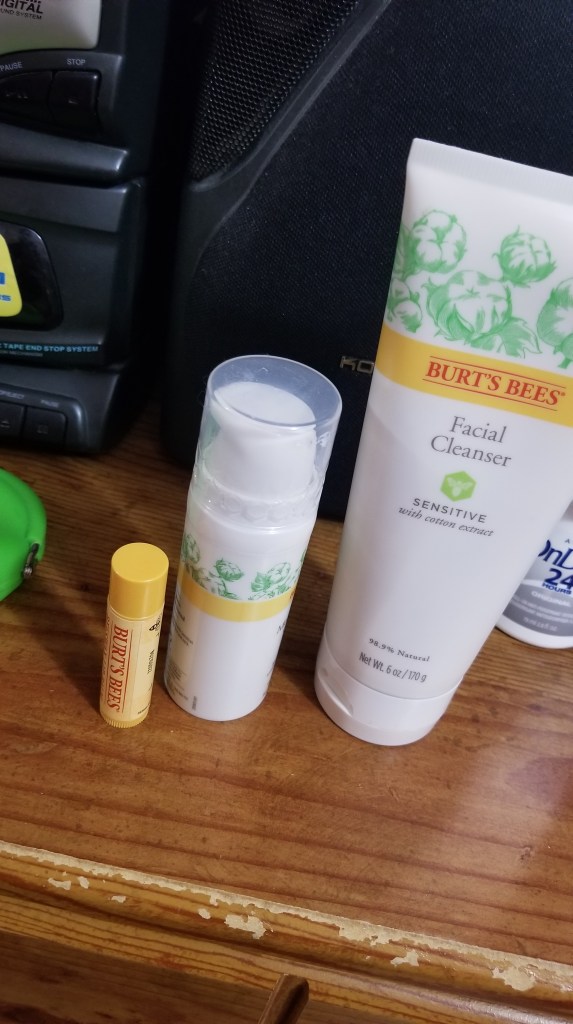 Photo description
Burt's Bees lip balm, face moisturizer and cleanser are on my vanity dresser. 
#skincare 
