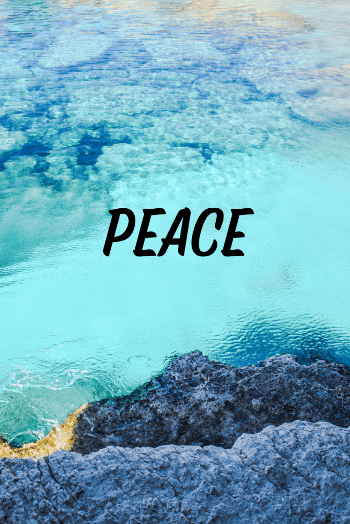 Photo description 
Photo is of a blue sky over water. Text in the center reads peace.