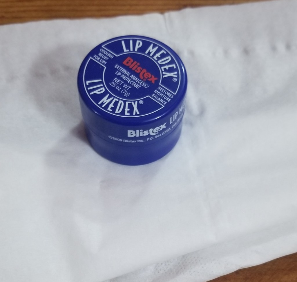Blistex lip balm container.