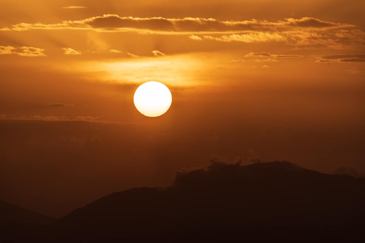 Sunset, the sky has a golden hue 